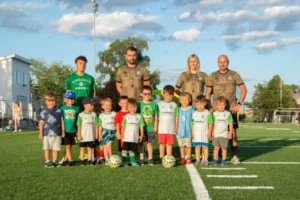 Kids team with coach